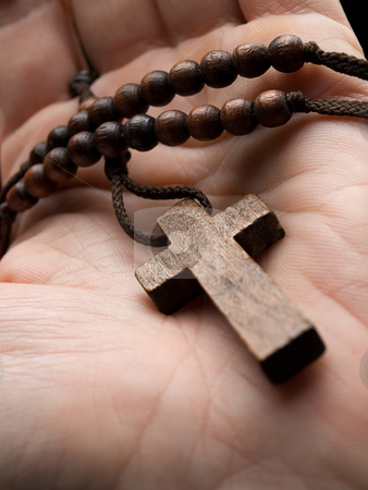 To use this stock image in your creative project, please select the size you need over to the right and click the "Add to Cart" button.
Your downloaded image will come with the Cutcaster watermark removed so don’t worry about the watermark you see on this page. Religious moment stock photo, Rosary in the hand with focus on the cross, shallow DOF by Vladimir Koletic