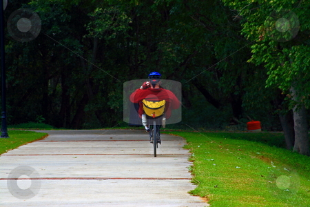 To use this stock image in your creative project, please select the size you need over to the right and click the "Add to Cart" button.
Your downloaded image will come with the Cutcaster watermark removed so don’t worry about the watermark you see on this page. Bike riding stock photo, Man exercising on bike trail by Jack Schiffer