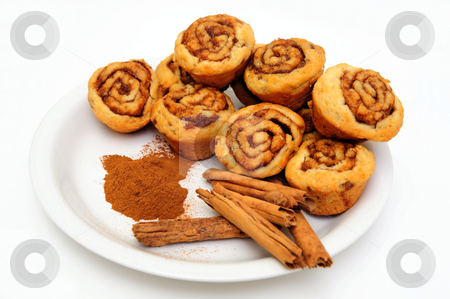 To use this stock image in your creative project, please select the size you need over to the right and click the "Add to Cart" button.
Your downloaded image will come with the Cutcaster watermark removed so don’t worry about the watermark you see on this page. Cinnamon Rolls stock photo, Powdered and stick cinnamon with freah baked mini cinnamon rolls on a white plate by Lynn Bendickson