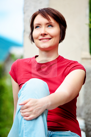 To use this stock image in your creative project, please select the size you need over to the right and click the "Add to Cart" button.
Your downloaded image will come with the Cutcaster watermark removed so don’t worry about the watermark you see on this page. Positive woman outdoors stock photo, Positive young woman outdoors looking up with smile by Natalia Macheda