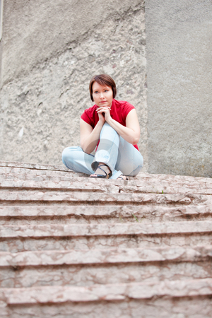 To use this stock image in your creative project, please select the size you need over to the right and click the "Add to Cart" button.
Your downloaded image will come with the Cutcaster watermark removed so don’t worry about the watermark you see on this page. Pensive young woman stock photo, Modern young woman thinking on ancient staircase by Natalia Macheda