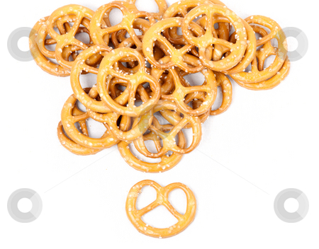 To use this stock image in your creative project, please select the size you need over to the right and click the "Add to Cart" button.
Your downloaded image will come with the Cutcaster watermark removed so don’t worry about the watermark you see on this page. Heap of pretzels stock photo, Heap of crunchy snacky pretzels on white canvas by Natalia Macheda