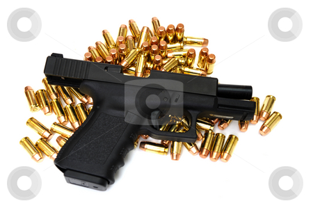 To use this stock image in your creative project, please select the size you need over to the right and click the "Add to Cart" button.
Your downloaded image will come with the Cutcaster watermark removed so don’t worry about the watermark you see on this page. Black Handgun stock photo, A semi automatic pistol with many .40 caliber brass cartridges. The weapon is locked open. by Lynn Bendickson