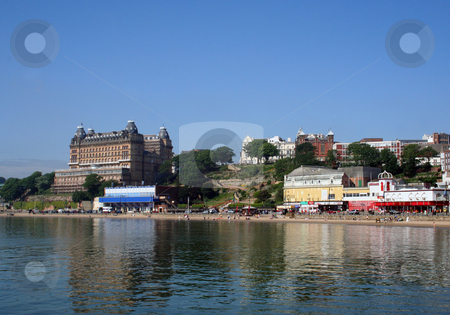 To use this stock image in your creative project, please select the size you need over to the right and click the "Add to Cart" button.
Your downloaded image will come with the Cutcaster watermark removed so don’t worry about the watermark you see on this page. Arcade amusements by beach stock photo, Scenic view of arcade amusements on waterfront with beach and ocean in foreground, Scarborough, North Yorkshire, England. by Martin Crowdy