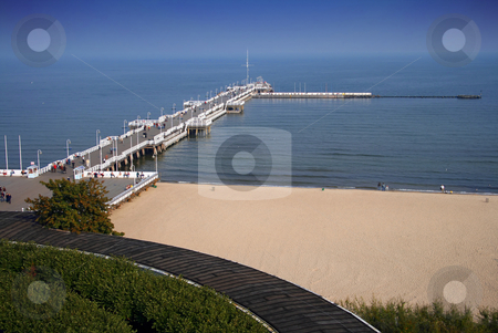 To use this stock image in your creative project, please select the size you need over to the right and click the "Add to Cart" button.
Your downloaded image will come with the Cutcaster watermark removed so don’t worry about the watermark you see on this page. Pier and Beach in Sopot stock photo, The wooden pier and beach in Sopot, Pomerania. by Interlight