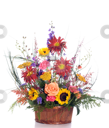 To use this stock image in your creative project, please select the size you need over to the right and click the "Add to Cart" button.
Your downloaded image will come with the Cutcaster watermark removed so don’t worry about the watermark you see on this page. Gift Basket Flower Bouquet stock photo, An expensive gift basket filled with fresh assorted flowers, isolated against a white background by Richard Nelson