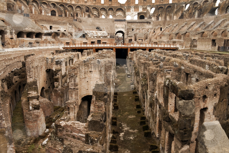 To use this stock image in your creative project, please select the size you need over to the right and click the "Add to Cart" button.
Your downloaded image will come with the Cutcaster watermark removed so don’t worry about the watermark you see on this page. Coliseum Floor stock photo, The historic Roman coliseum located in Rome (Roma) Italy by Kevin Tietz