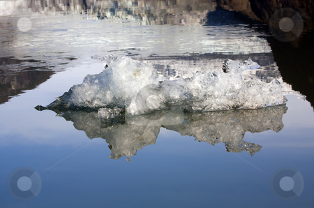 To use this stock image in your creative project, please select the size you need over to the right and click the "Add to Cart" button.
Your downloaded image will come with the Cutcaster watermark removed so don’t worry about the watermark you see on this page. Artic Reflections stock photo, A small iceberg floats in Mendenhall Lake, Juneau Alaska by Mike Dawson
