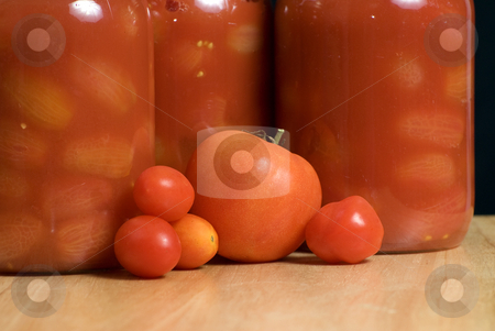 To use this stock image in your creative project, please select the size you need over to the right and click the "Add to Cart" button.
Your downloaded image will come with the Cutcaster watermark removed so don’t worry about the watermark you see on this page. Mason Jars of Tomatoes stock photo, Mason jars full of canned tomatoes shot on a wooden cutting board by Richard Nelson