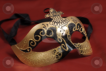 To use this stock image in your creative project, please select the size you need over to the right and click the "Add to Cart" button.
Your downloaded image will come with the Cutcaster watermark removed so don’t worry about the watermark you see on this page. Golden Mask stock photo, Closeup of a venetian mask commonly used in theatrical plays shot on red by Richard Nelson