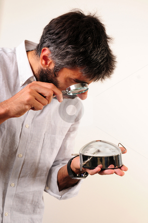 To use this stock image in your creative project, please select the size you need over to the right and click the "Add to Cart" button.
Your downloaded image will come with the Cutcaster watermark removed so don’t worry about the watermark you see on this page. What time is it stock photo, What time is it. Man looking to clock by Mehmet ali Ertek