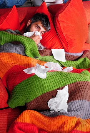 To use this stock image in your creative project, please select the size you need over to the right and click the "Add to Cart" button.
Your downloaded image will come with the Cutcaster watermark removed so don’t worry about the watermark you see on this page. At Home with the Flu and Kitty stock photo, A man at home with the flu. He's wrapped up in a blanket on the couch with his cat and tissue paper. by Mehmet ali Ertek