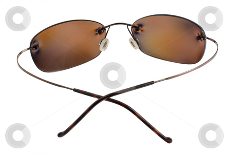 To use this stock image in your creative project, please select the size you need over to the right and click the "Add to Cart" button.
Your downloaded image will come with the Cutcaster watermark removed so don’t worry about the watermark you see on this page. Polarizing sunglasses with brown lenses stock photo, Sunglasses with brown polarizing lenses isolated on white by Marek Uliasz