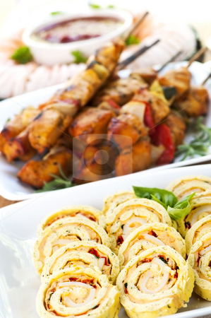 To use this stock image in your creative project, please select the size you need over to the right and click the "Add to Cart" button.
Your downloaded image will come with the Cutcaster watermark removed so don’t worry about the watermark you see on this page. Assorted appetizers stock photo, Many dishes of bite size appetizers and party food by Elena Elisseeva