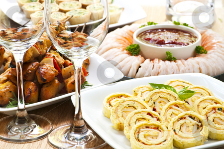 To use this stock image in your creative project, please select the size you need over to the right and click the "Add to Cart" button.
Your downloaded image will come with the Cutcaster watermark removed so don’t worry about the watermark you see on this page. Assorted appetizers stock photo, Many dishes of bite size appetizers and party food by Elena Elisseeva