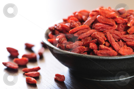 To use this stock image in your creative project, please select the size you need over to the right and click the "Add to Cart" button.
Your downloaded image will come with the Cutcaster watermark removed so don’t worry about the watermark you see on this page. Goji berries stock photo, Full bowl of red dried goji berries by Elena Elisseeva