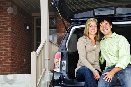 To use this stock image in your creative project, please select the size you need over to the right and click the "Add to Cart" button.
Your downloaded image will come with the Cutcaster watermark removed so don’t worry about the watermark you see on this page. Couple sitting in back of car stock photo, Happy young couple sitting at back of car on driveway by Elena Elisseeva