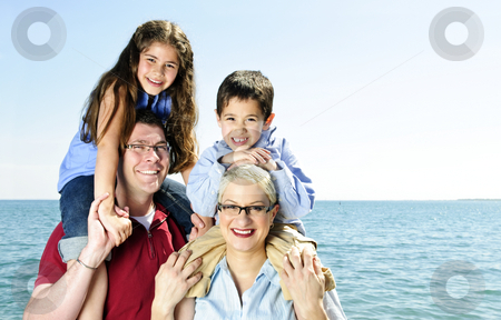 To use this stock image in your creative project, please select the size you need over to the right and click the "Add to Cart" button.
Your downloaded image will come with the Cutcaster watermark removed so don’t worry about the watermark you see on this page. Happy family fun stock photo, Happy family having fun giving shoulder rides by Elena Elisseeva