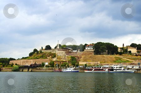 To use this stock image in your creative project, please select the size you need over to the right and click the "Add to Cart" button.
Your downloaded image will come with the Cutcaster watermark removed so don’t worry about the watermark you see on this page. Kalemegdan fortress in Belgrade stock photo, Kalemegdan fortress in Belgrade seen from Danube river by Elena Elisseeva