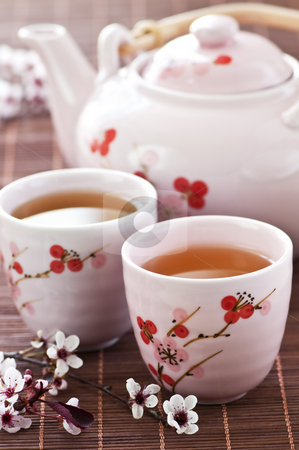 To use this stock image in your creative project, please select the size you need over to the right and click the "Add to Cart" button.
Your downloaded image will come with the Cutcaster watermark removed so don’t worry about the watermark you see on this page. Green tea set stock photo, Green tea set with teapot and cups by Elena Elisseeva