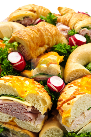 To use this stock image in your creative project, please select the size you need over to the right and click the "Add to Cart" button.
Your downloaded image will come with the Cutcaster watermark removed so don’t worry about the watermark you see on this page. Sandwich tray stock photo, Assorted platter of sandwiches with meat and vegetables by Elena Elisseeva