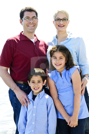 To use this stock image in your creative project, please select the size you need over to the right and click the "Add to Cart" button.
Your downloaded image will come with the Cutcaster watermark removed so don’t worry about the watermark you see on this page. Happy family stock photo, Portrait of happy family of four standing by Elena Elisseeva