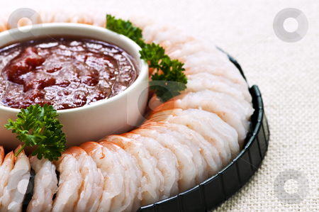 To use this stock image in your creative project, please select the size you need over to the right and click the "Add to Cart" button.
Your downloaded image will come with the Cutcaster watermark removed so don’t worry about the watermark you see on this page. Shrimp ring stock photo, Shrimp ring appetizer platter with dipping sauce by Elena Elisseeva