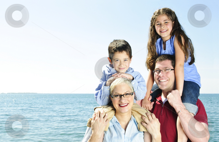 To use this stock image in your creative project, please select the size you need over to the right and click the "Add to Cart" button.
Your downloaded image will come with the Cutcaster watermark removed so don’t worry about the watermark you see on this page. Happy family fun stock photo, Happy family having fun giving shoulder rides by Elena Elisseeva