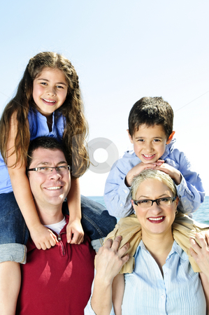 To use this stock image in your creative project, please select the size you need over to the right and click the "Add to Cart" button.
Your downloaded image will come with the Cutcaster watermark removed so don’t worry about the watermark you see on this page. Happy family fun stock photo, Happy family having fun giving shoulder rides by Elena Elisseeva