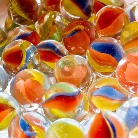 To use this stock image in your creative project, please select the size you need over to the right and click the "Add to Cart" button.
Your downloaded image will come with the Cutcaster watermark removed so don’t worry about the watermark you see on this page. Colored Marbles stock photo, Colored Marbles by Jim DeLillo