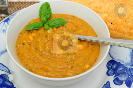 To use this stock image in your creative project, please select the size you need over to the right and click the "Add to Cart" button.
Your downloaded image will come with the Cutcaster watermark removed so don’t worry about the watermark you see on this page. Creamy Vegetable Soup stock photo, Hot vegetable soup with a sprig of basil served in a white bowl by Lynn Bendickson