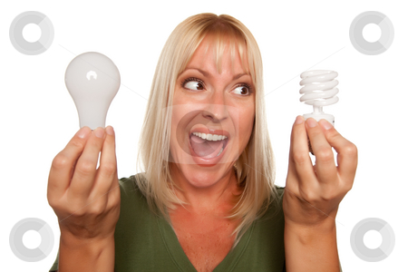 To use this stock image in your creative project, please select the size you need over to the right and click the "Add to Cart" button.
Your downloaded image will come with the Cutcaster watermark removed so don’t worry about the watermark you see on this page. Woman Holds Energy Saving and Regular Light Bulbs stock photo, Woman Holds Energy Saving and Regular Light Bulbs Isolated on a White Background. by Andy Dean