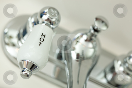To use this stock image in your creative project, please select the size you need over to the right and click the "Add to Cart" button.
Your downloaded image will come with the Cutcaster watermark removed so don’t worry about the watermark you see on this page. Abstract of Classic Chrome Faucet stock photo, Abstract of Classic Chrome Sink Faucet by Andy Dean