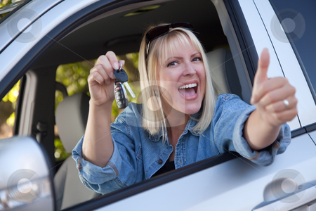 To use this stock image in your creative project, please select the size you need over to the right and click the "Add to Cart" button.
Your downloaded image will come with the Cutcaster watermark removed so don’t worry about the watermark you see on this page. Attractive Woman In New Car with Keys stock photo, Attractive Happy Woman In New Car with Keys. by Andy Dean