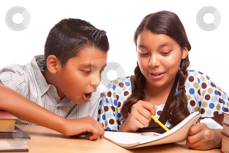 To use this stock image in your creative project, please select the size you need over to the right and click the "Add to Cart" button.
Your downloaded image will come with the Cutcaster watermark removed so don’t worry about the watermark you see on this page. Hispanic Brother and Sister Having Fun Studying stock photo, Hispanic Brother and Sister Having Fun Studying Together Isolated on a White Background. by Andy Dean