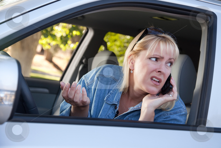 To use this stock image in your creative project, please select the size you need over to the right and click the "Add to Cart" button.
Your downloaded image will come with the Cutcaster watermark removed so don’t worry about the watermark you see on this page. Concerned Woman Using Cell Phone While Driving stock photo, Concerned Blonde Woman Using Cell Phone While Driving. by Andy Dean