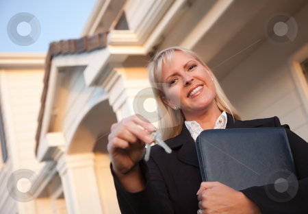 To use this stock image in your creative project, please select the size you need over to the right and click the "Add to Cart" button.
Your downloaded image will come with the Cutcaster watermark removed so don’t worry about the watermark you see on this page. Real Estate Agent Handing Over Keys to New Home stock photo, Female Real Estate Agent Handing Over Keys in Front of Beautiful House. by Andy Dean