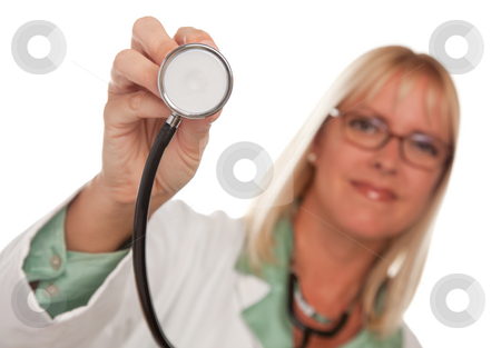 To use this stock image in your creative project, please select the size you need over to the right and click the "Add to Cart" button.
Your downloaded image will come with the Cutcaster watermark removed so don’t worry about the watermark you see on this page. Attractive Female Doctor Holding Stethoscope stock photo, Attractive Female Doctor Holding Stethoscope Isolated on a White Background. by Andy Dean