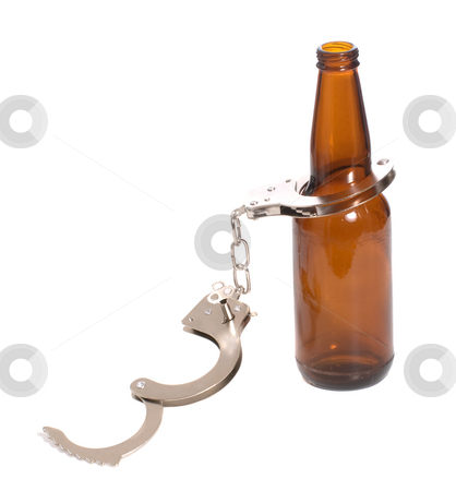 To use this stock image in your creative project, please select the size you need over to the right and click the "Add to Cart" button.
Your downloaded image will come with the Cutcaster watermark removed so don’t worry about the watermark you see on this page. Illegal stock photo, Concept image of drinking illegally featuring a beer bottle and a pair of handcuffs, isolated against a white background by Richard Nelson