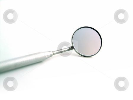 To use this stock image in your creative project, please select the size you need over to the right and click the "Add to Cart" button.
Your downloaded image will come with the Cutcaster watermark removed so don’t worry about the watermark you see on this page. Angled mirror stock photo, Close-up of a dental mirror by Adam Radosavljevic