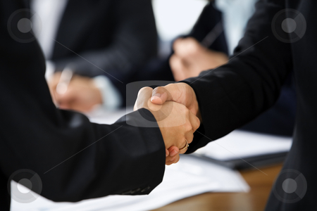To use this stock image in your creative project, please select the size you need over to the right and click the "Add to Cart" button.
Your downloaded image will come with the Cutcaster watermark removed so don’t worry about the watermark you see on this page. Handshake between two businesswoman stock photo, Handshake between two businesswoman with other business people on background. Different skin tones by Rudyanto Wijaya
