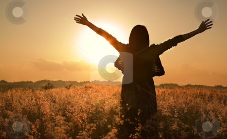 To use this stock image in your creative project, please select the size you need over to the right and click the "Add to Cart" button.
Your downloaded image will come with the Cutcaster watermark removed so don’t worry about the watermark you see on this page. Woman silhouette waiting for summer sun stock photo, Woman silhouette waiting for summer sun on meadow by Rudyanto Wijaya