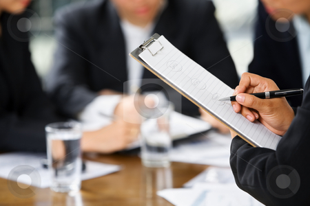 To use this stock image in your creative project, please select the size you need over to the right and click the "Add to Cart" button.
Your downloaded image will come with the Cutcaster watermark removed so don’t worry about the watermark you see on this page. Hand writing with other business people in background stock photo, Businesswoman's hand writing with other business people in background by Rudyanto Wijaya