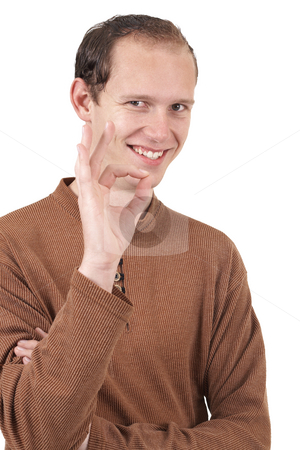 To use this stock image in your creative project, please select the size you need over to the right and click the "Add to Cart" button.
Your downloaded image will come with the Cutcaster watermark removed so don’t worry about the watermark you see on this page. Young caucasian man stock photo, Young caucasian man wearing trendy clothes showing an ok sign with his hand. Isolated on white background by Elena Weber (nee Talberg)