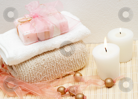 To use this stock image in your creative project, please select the size you need over to the right and click the "Add to Cart" button.
Your downloaded image will come with the Cutcaster watermark removed so don’t worry about the watermark you see on this page. Relaxing spa scene with body products stock photo, Relaxing spa scene with exfoliating body sponge, face towel, handmade soap and candles by Elena Weber (nee Talberg)