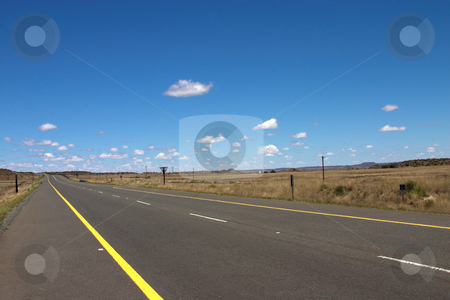 To use this stock image in your creative project, please select the size you need over to the right and click the "Add to Cart" button.
Your downloaded image will come with the Cutcaster watermark removed so don’t worry about the watermark you see on this page. Road to heaven. stock photo, The road on a sunny summer day. by Elena Weber (nee Talberg)
