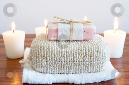 To use this stock image in your creative project, please select the size you need over to the right and click the "Add to Cart" button.
Your downloaded image will come with the Cutcaster watermark removed so don’t worry about the watermark you see on this page. Relaxing spa scene with body products stock photo, Relaxing spa scene with sponge, handmade soap, white towel and candles in the background by Elena Weber (nee Talberg)