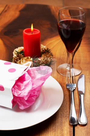 To use this stock image in your creative project, please select the size you need over to the right and click the "Add to Cart" button.
Your downloaded image will come with the Cutcaster watermark removed so don’t worry about the watermark you see on this page. Table setting with a gift bag on plate stock photo, Table setting with a pink polka-dot gift bag on white plate and candle in the background by Elena Weber (nee Talberg)