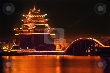 To use this stock image in your creative project, please select the size you need over to the right and click the "Add to Cart" button.
Your downloaded image will come with the Cutcaster watermark removed so don’t worry about the watermark you see on this page. Ancient Temple Night Reflection Bridge Jinming Lake Kaifeng Chin stock photo, Ancient Temple Night Reflection Bridge Jinming Lake Kaifeng China Kaifeng was the capital of the Song Dynasty, 1000 to 1100AD. by William Perry