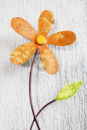 To use this stock image in your creative project, please select the size you need over to the right and click the "Add to Cart" button.
Your downloaded image will come with the Cutcaster watermark removed so don’t worry about the watermark you see on this page. Flower stock photo, Orange ornament flower with green leaf over wall background by Giuseppe Ramos